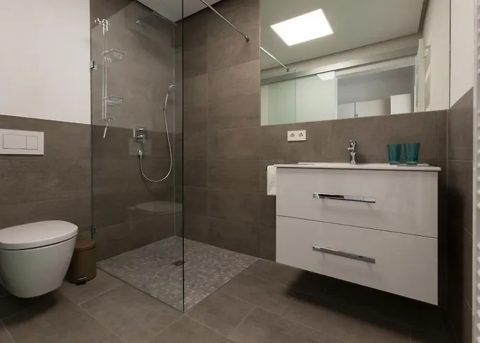 Апартаменты Boardinghouse E68 Шлинген