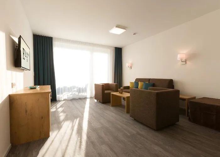 Апартаменты Boardinghouse E68 Шлинген