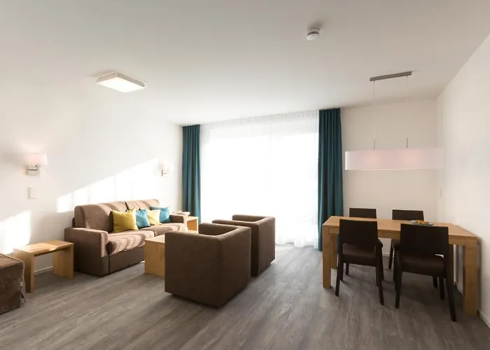 Апартаменты Boardinghouse E68 Шлинген