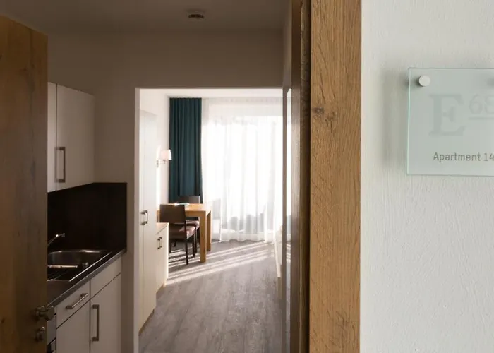 Апартаменты Boardinghouse E68 Шлинген